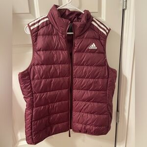 Women’s size XL Adidas maroon vest. (Excellent condition).